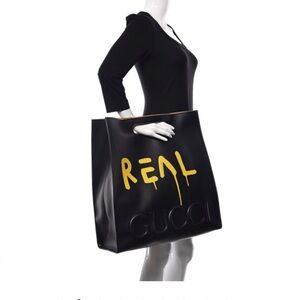 This is an authentic GUCCI Calfskin Large GucciGhost XL Tote in Black.